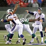 Broncos quarterback Jay Cutler throws a pass
